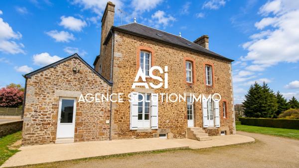 Maison familiale en pierre avec 5 chambres, grenier aménageable et 3 garages.