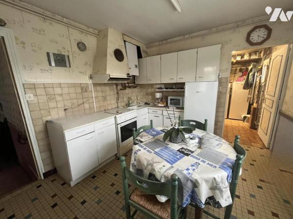 Maison de ville à rénover – Évron 