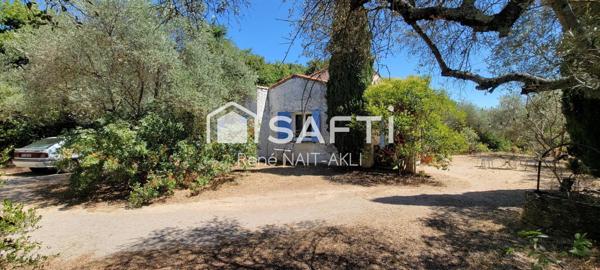 Maison 5 pièces de 108 m2 sur un terrain de 1615 m2 arboré, piscinable.