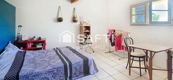 Maison 5 pièces de 108 m2 sur un terrain de 1615 m2 arboré, piscinable.