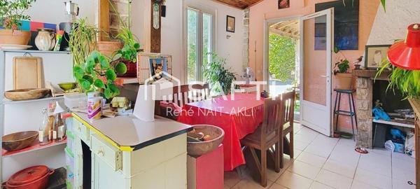 Maison 5 pièces de 108 m2 sur un terrain de 1615 m2 arboré, piscinable.