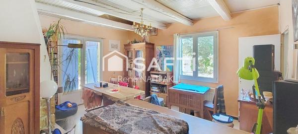 Maison 5 pièces de 108 m2 sur un terrain de 1615 m2 arboré, piscinable.