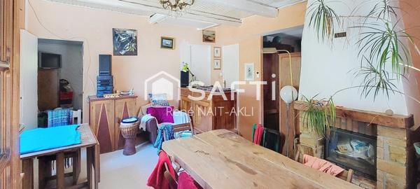 Maison 5 pièces de 108 m2 sur un terrain de 1615 m2 arboré, piscinable.