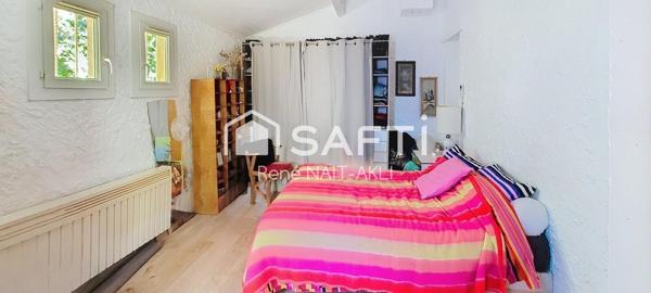 Maison 5 pièces de 108 m2 sur un terrain de 1615 m2 arboré, piscinable.