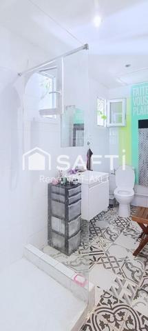 Maison 5 pièces de 108 m2 sur un terrain de 1615 m2 arboré, piscinable.