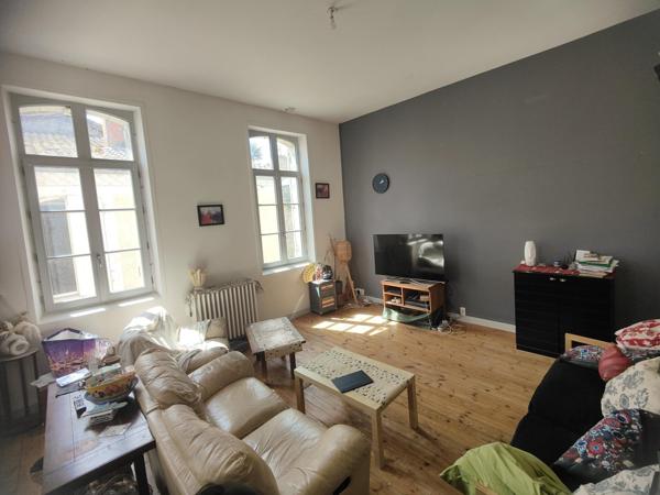 IMMEUBLE DE RAPPORT AVEC APPARTEMENT ET COMMERCE