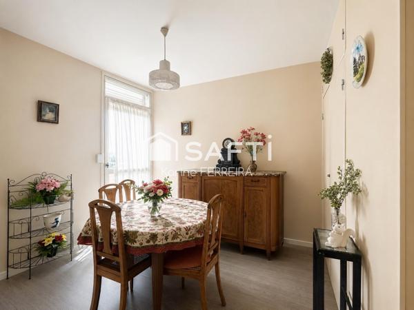 Appartement 3 pièces de 58 m² à rénover avec balcon, cave et stationnement