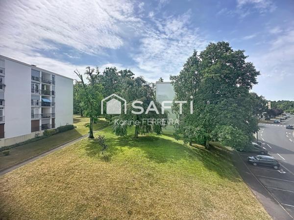 Appartement 3 pièces de 58 m² à rénover avec balcon, cave et stationnement