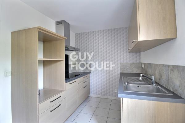 À vendre – Duplex avec terrasse, parking et cave à Neuves-Maisons
