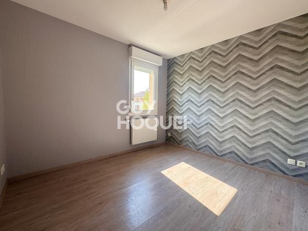 À vendre – Duplex avec terrasse, parking et cave à Neuves-Maisons