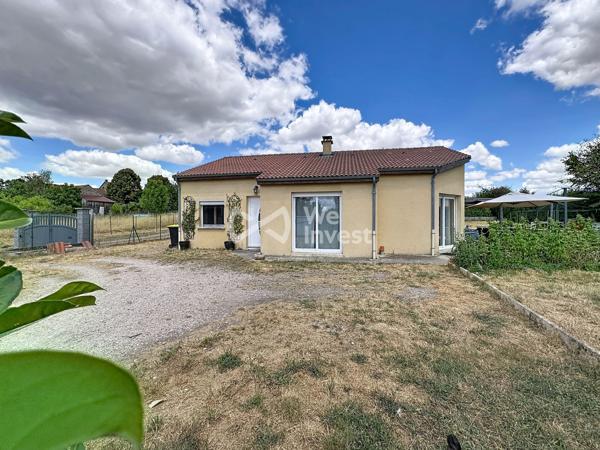 Villa de type 5 avec terrasse, pergola et jardin.