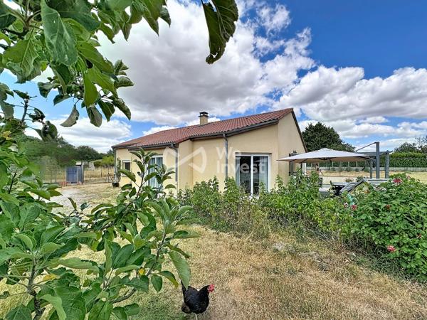 Villa de type 5 avec terrasse, pergola et jardin.