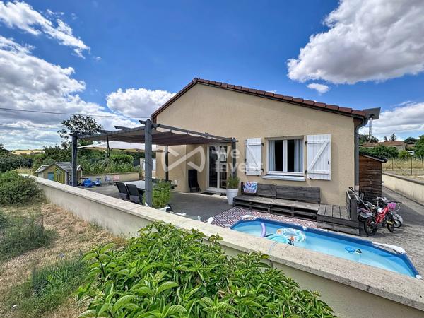 Villa de type 5 avec terrasse, pergola et jardin.