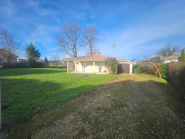 MAISON DE PLAIN PIED AVEC JARDIN ET GARAGE