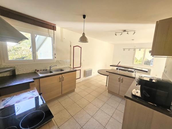 MAISON DE PLAIN PIED AVEC JARDIN ET GARAGE