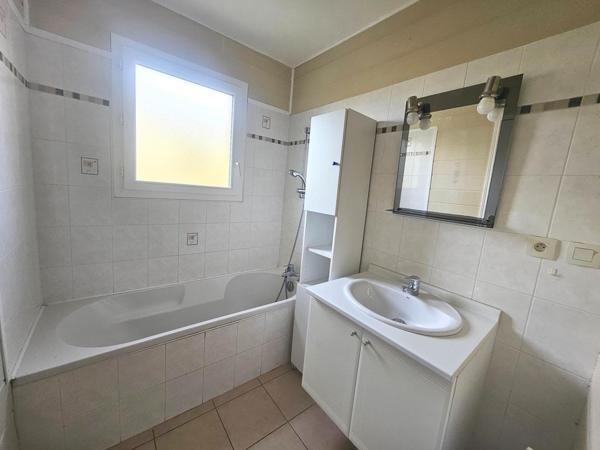 MAISON DE PLAIN PIED AVEC JARDIN ET GARAGE