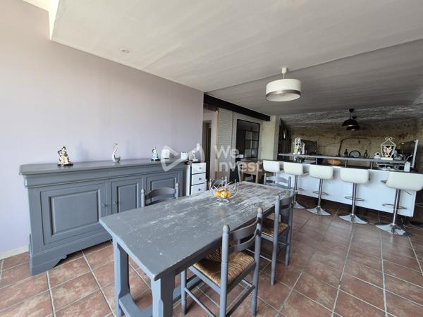 Maison semi-troglodytique avec dépendances