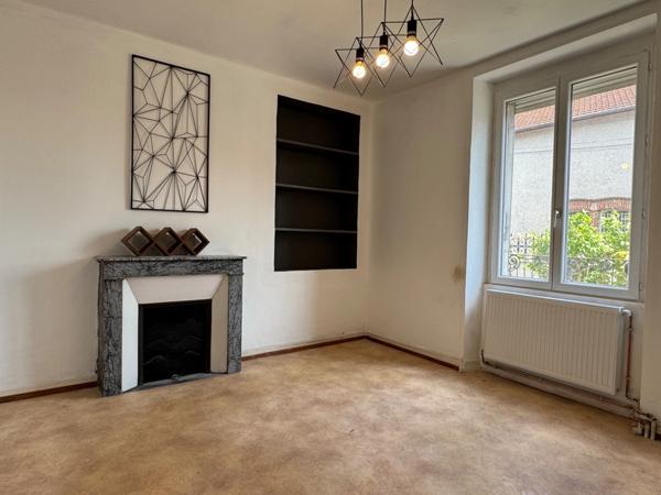 UN GRAND POTENTIEL POUR UNE DEMEURE DE CARACTERE EN CENTRE VILLE AVEC JARDIN ET GARAGE