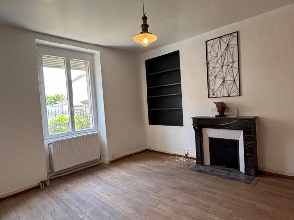 UN GRAND POTENTIEL POUR UNE DEMEURE DE CARACTERE EN CENTRE VILLE AVEC JARDIN ET GARAGE