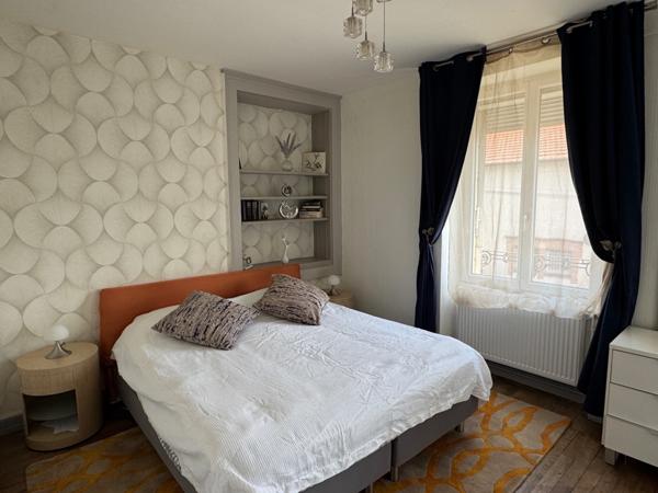 UN GRAND POTENTIEL POUR UNE DEMEURE DE CARACTERE EN CENTRE VILLE AVEC JARDIN ET GARAGE