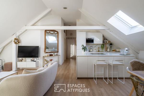 Loft baigné de lumière dans une ancienne teinturerie