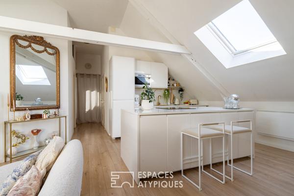 Loft baigné de lumière dans une ancienne teinturerie