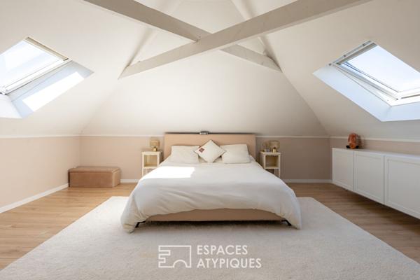 Loft baigné de lumière dans une ancienne teinturerie