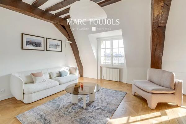 DUPLEX PLACE DES VOSGES.