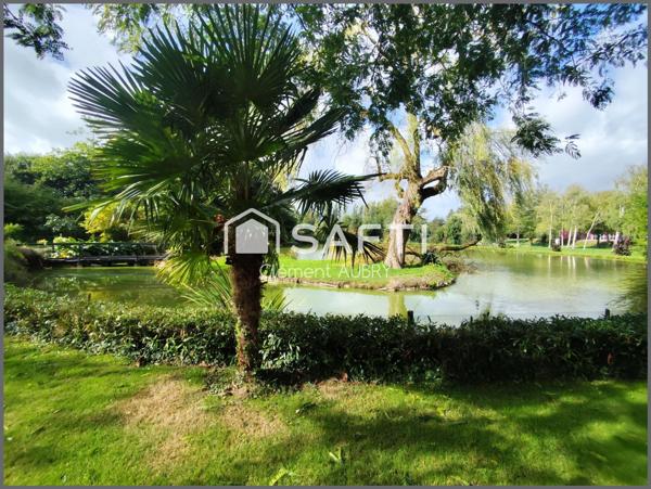 Venez découvrir cette maison pleine de charme, nichée sur un terrain exceptionnel avec son bel étang privatif !