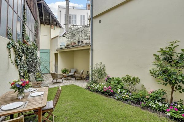 APPARTEMENT BAS CÔTE PAVÉE -