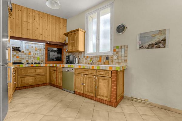 APPARTEMENT BAS CÔTE PAVÉE -