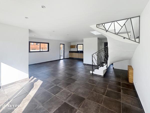montrond-les-bains maison de 115m2 implantée sur 200m2 de terrain avec garage