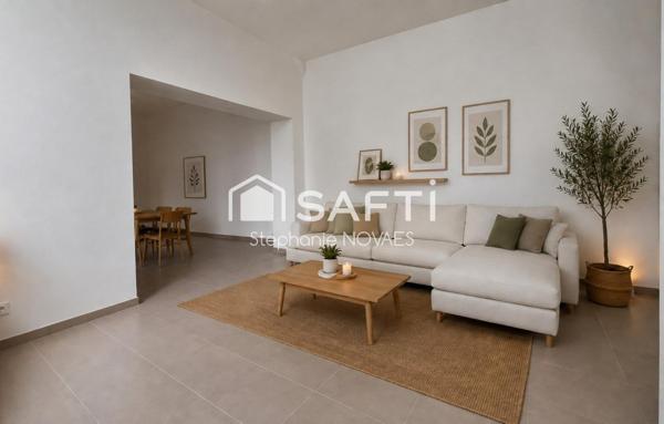 Appartement haussmannien rénové avec terrasse rare en plein cœur de Béziers.