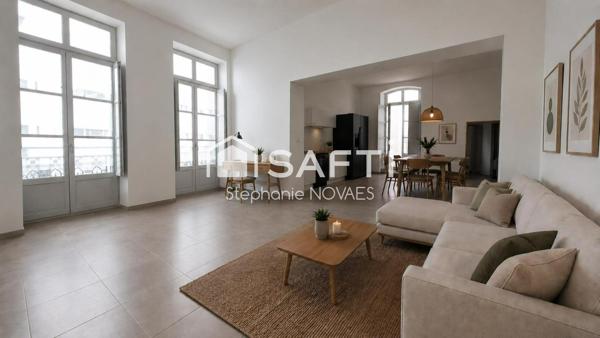 Appartement haussmannien rénové avec terrasse rare en plein cœur de Béziers.
