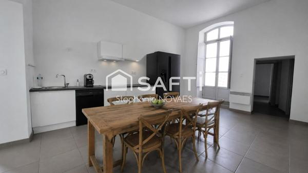 Appartement haussmannien rénové avec terrasse rare en plein cœur de Béziers.