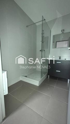 Appartement haussmannien rénové avec terrasse rare en plein cœur de Béziers.