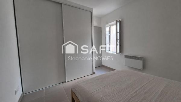 Appartement haussmannien rénové avec terrasse rare en plein cœur de Béziers.