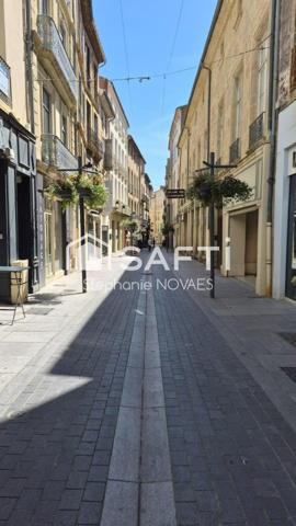 Appartement haussmannien rénové avec terrasse rare en plein cœur de Béziers.