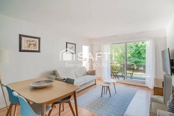 Appartement de 3 pièces avec balcon dans résidence verdoyante