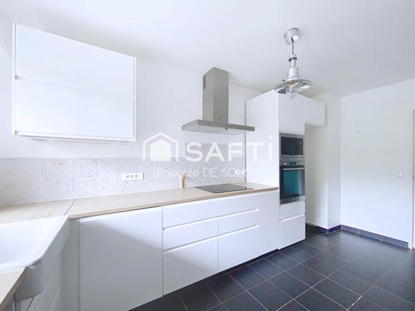 Appartement de 3 pièces avec balcon dans résidence verdoyante