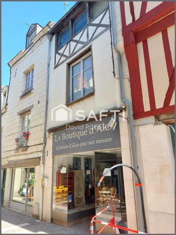 Immeuble avec boutique et 2 étages aménageables