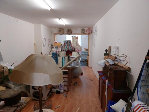 Immeuble avec boutique et 2 étages aménageables