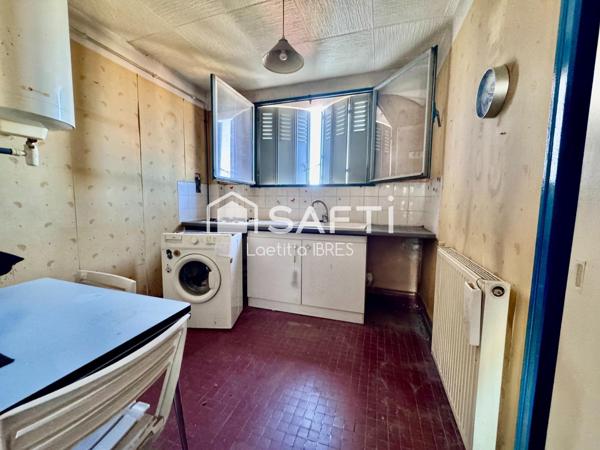 T3 à rénover avec balcon et vue sur le canal