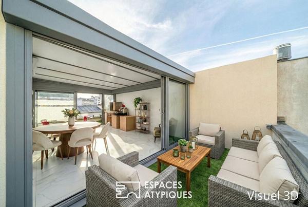 Duplex traversant au dernier étage avec terrasses dans le village Saint-Charles