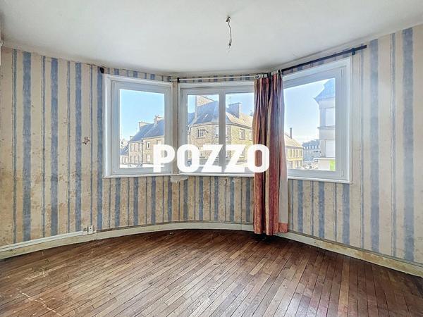 A Vendre - Immeuble 185 m² - Saint Hilaire Du Harcouet - Local commercial - Appartement - cour SAINT HILAIRE DU HARCOUET