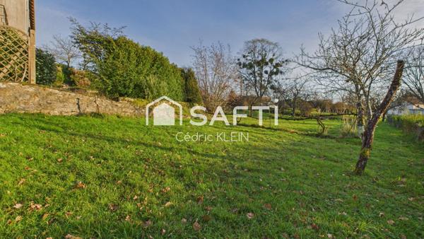 Maison sur sous sol avec potentiel