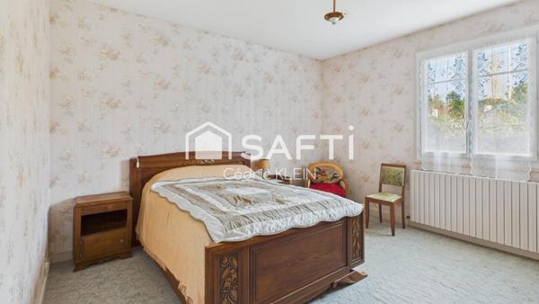 Maison sur sous sol avec potentiel