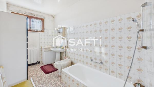 Maison sur sous sol avec potentiel