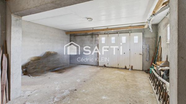 Maison sur sous sol avec potentiel