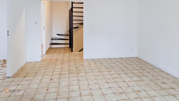 Immeuble de rapport avec appartement et local commercial